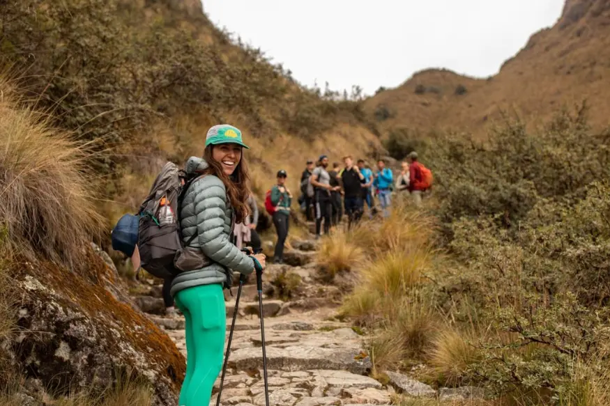 Trekker hiking steep Inca Trail stairs in October